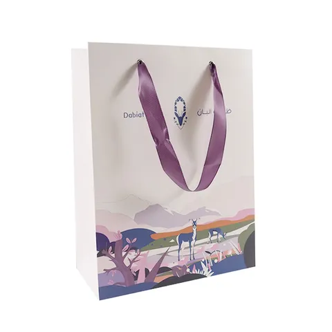 White boutique paper bag with satin ribbon handles